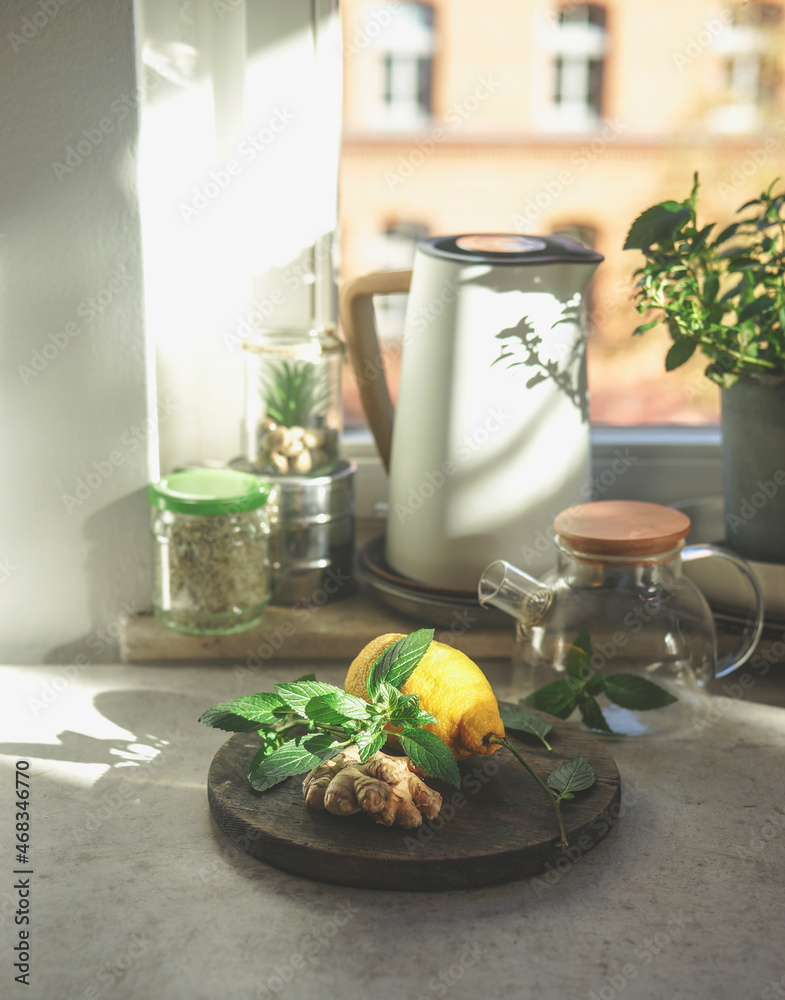 Preparing fresh ginger tea with healthy ingredients at home. Ginger