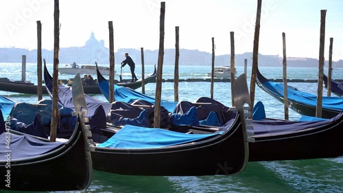 Europe, Venice November 2021 - Italy , Venice - Ancient  gondolas boats for tourists in the Venice lagoon - Resumption of tourism with the end of the lockdown due  Covid-19 Coronavirus - Canal Grande