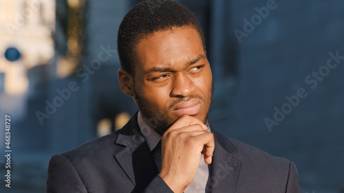 Quadro em tela Pensive millennial black student considering choice makes difficult decision out