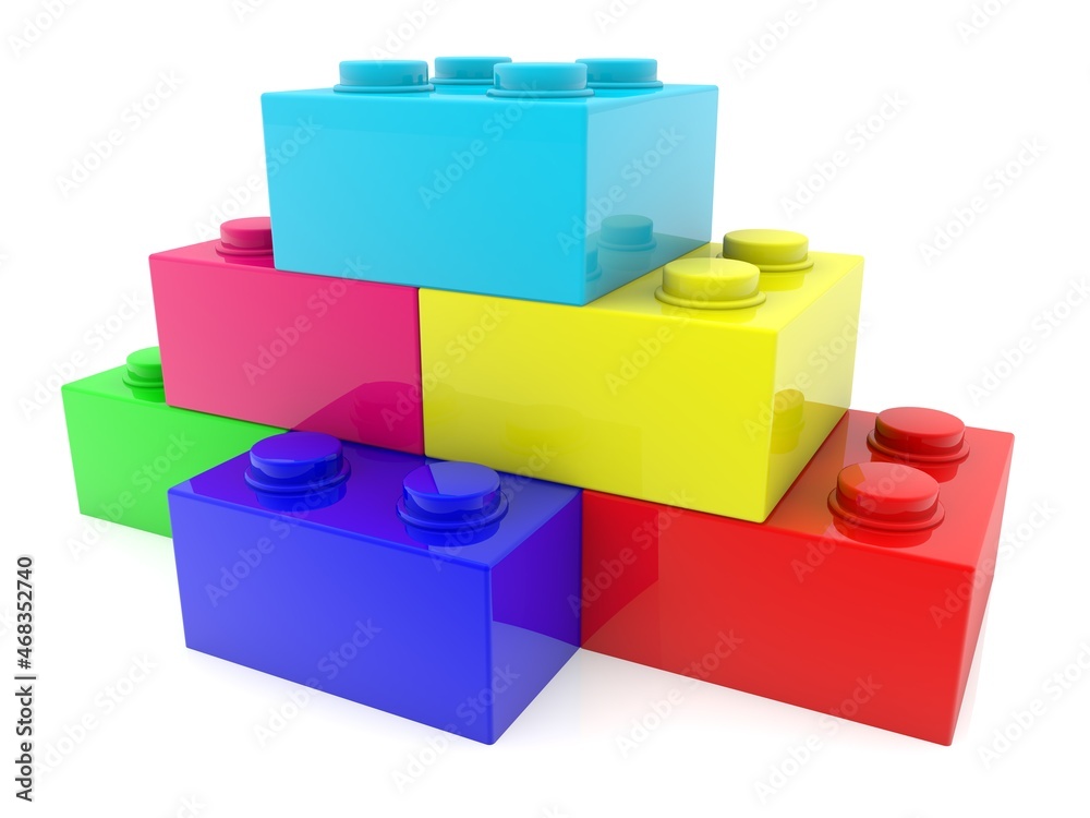 Colored toy bricks are connected to each other on a white background Colored toy bricks are connected to each other on a white background