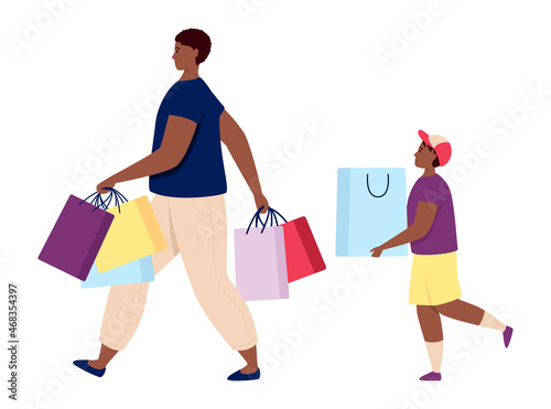 Father and son carrying shopping bags with purchases