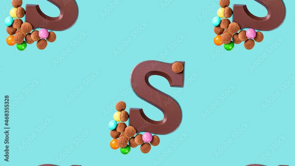 Festive collage with chocolate letter S, kruidnoten cookies and traditional hollands sweets. Dutch holiday Sinterklaas background. FullHD video
