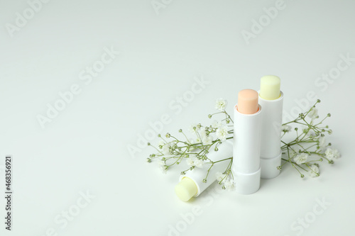 Concept of cosmetic with eco hygienic lipstick on white background