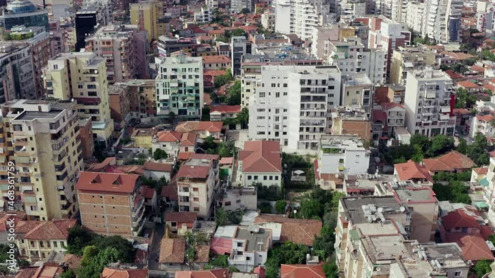 Aerial view Tirana Albania. Drone flying over houses and high-rises in the city center with streets and roads. Aerial view Tirana Albania. Drone flying over houses and high-rises in the city center with streets and roads.