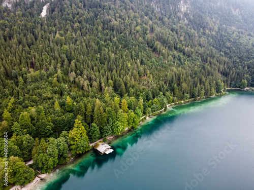 small house on the lake in the mountains