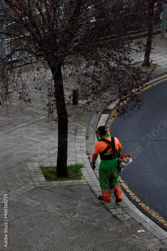 Gardener working in the street