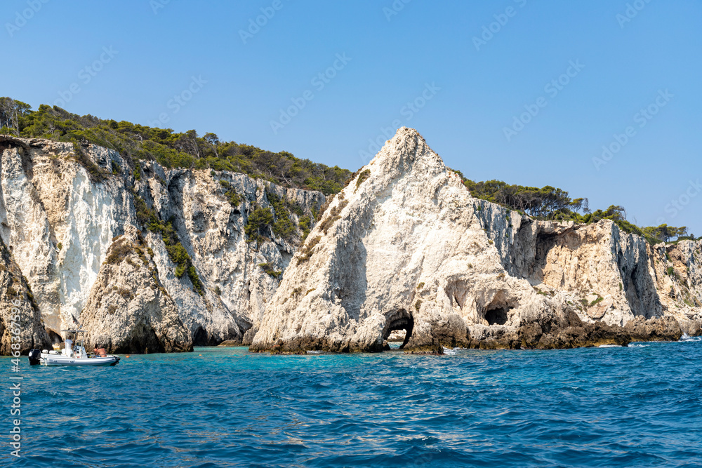 Faraglioni of the Tremiti islands. White rocks and the Bay of Pagliai at the island of San Domino of the archipelago of the Tremiti Islands in Puglia, Italy.