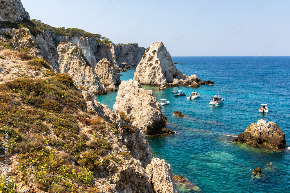Cliff, stacks and the bay of Pagliai of the island of San Domino of the archipelago of the Tremiti Islands, Puglia, Italy