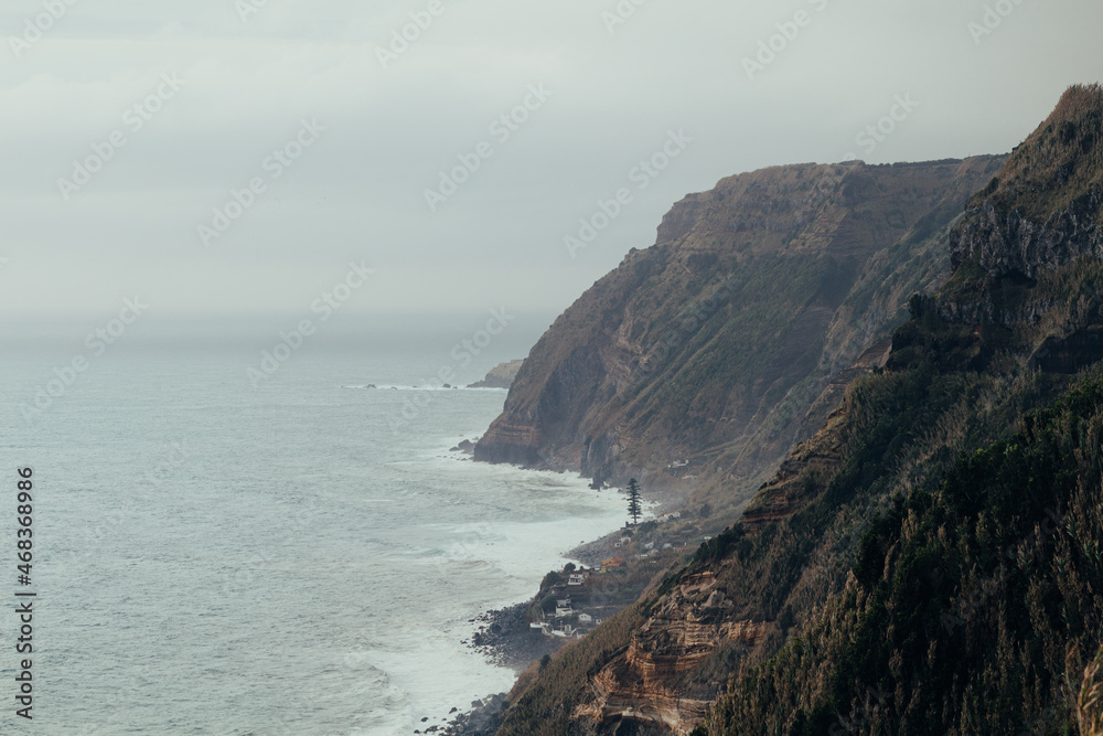 Cliffs in the atlantic ocean on a foggy day