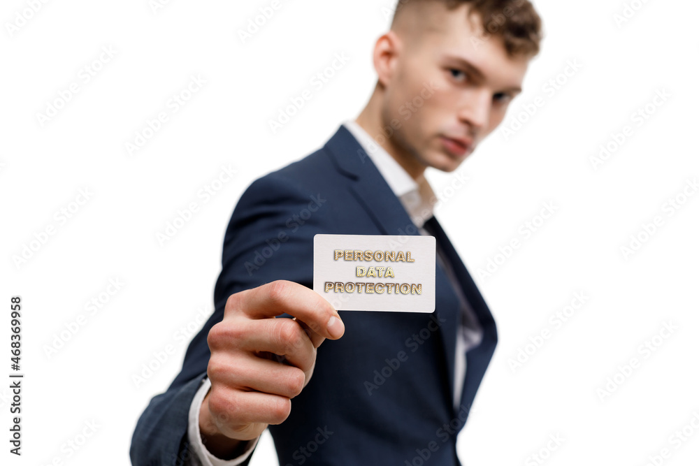 A businessman shows an inscription: PERSONAL DATA PROTECTION A businessman shows an inscription: PERSONAL DATA PROTECTION