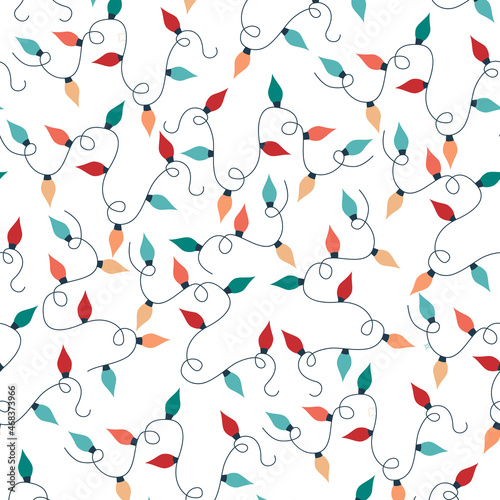 Seamless pattern of colorful Christmas light bulbs. Vector illustration in a flat style