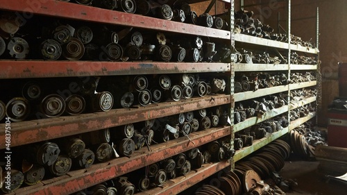 Photography Salvage yard containing new, old, and rare cars, and trucks