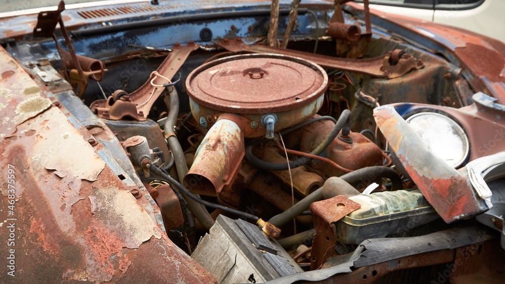 Salvage yard containing new, old, and rare cars, and trucks. Engine parts. Salvage yard containing new, old, and rare cars, and trucks. Engine parts.