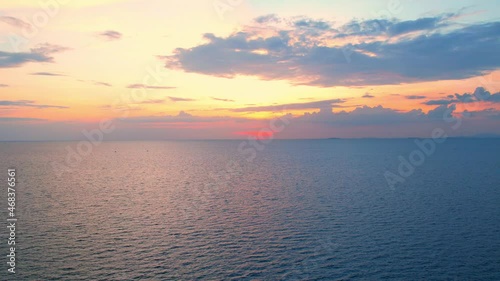 Wallpaper Mural 4K drone flying over the sea, sunset on the horizon. The orange and yellow light reflected in the beautiful sea waves. tropical sea in thailand Torontodigital.ca