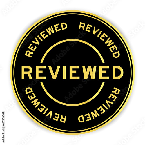 Black and gold color round label sticker with word reviewed on white background