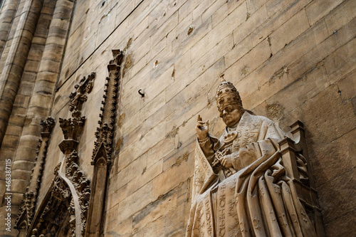 Sculpture of Pope Pius XI on the wall in the Duomo. Milan, Italy photo