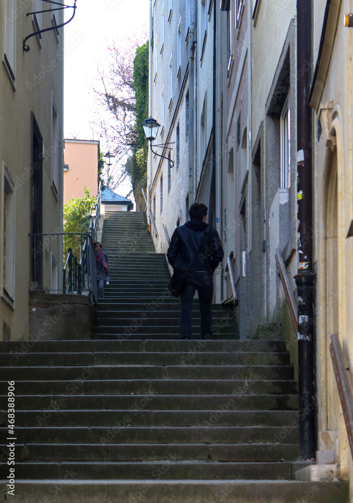 Austria. Spring. Day. Salzburg. View of a deserted staircase of residential buildings leading up.