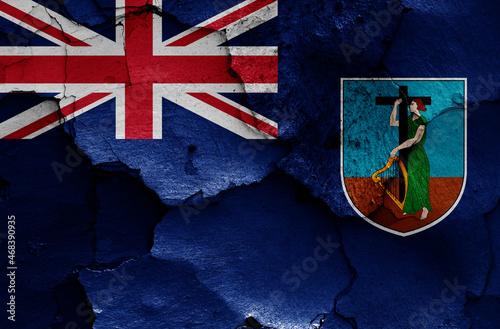 flag of Montserrat painted on cracked wall
