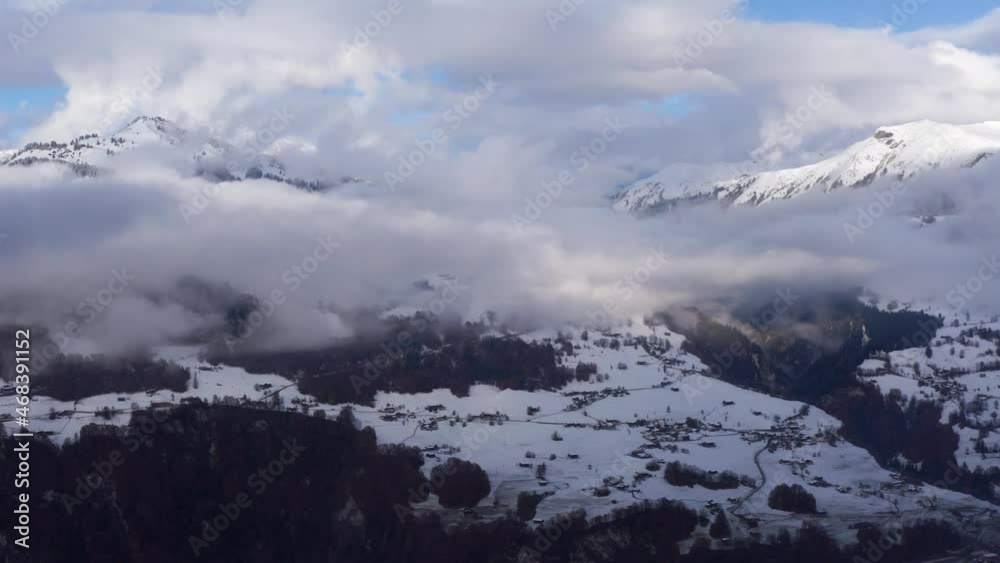 alp mountains in switzerland in winter fog alp mountains in switzerland in winter fog