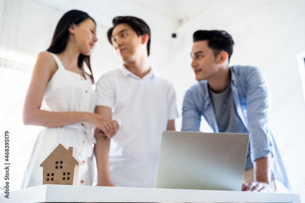 House model with customer contract to buy the house House model with customer contract to buy the house