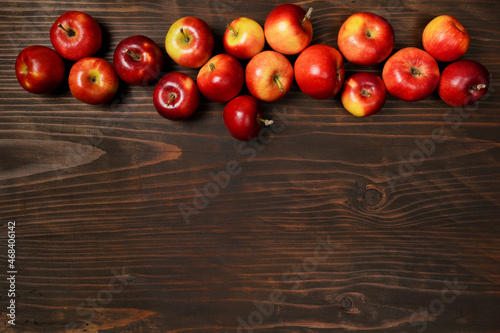 Fresh red apples on wooden table.Fruits. Top view. Free space for text. 