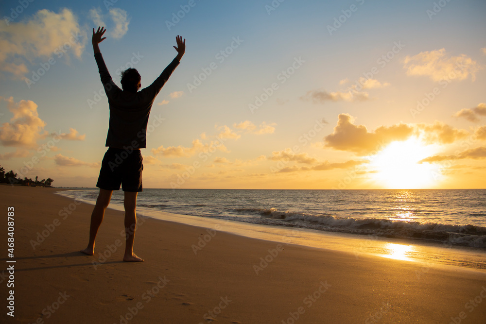 Man Enjoying the Brazilian Sunset Beach	
