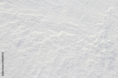Snow texture with wavy solid surface, winter background