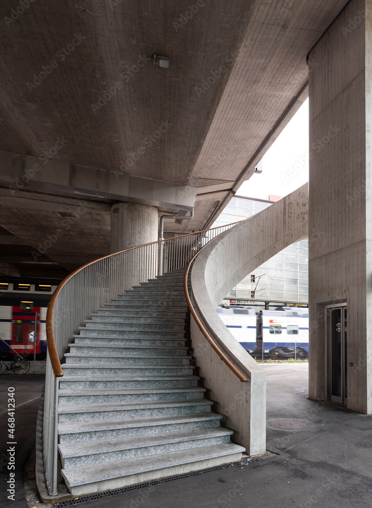Massive staircase of a Swiss train station on a Sunday morning without people Massive staircase of a Swiss train station on a Sunday morning without people
