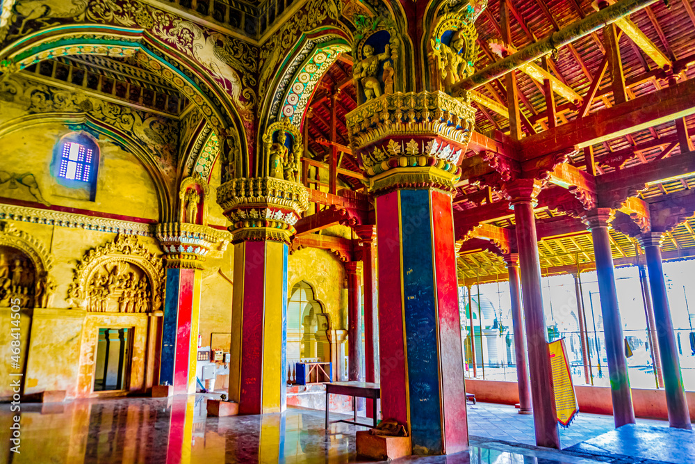 Thanjavur, Tamil Nadu, India - The high arches artworks and colorfully painted wall murals and ceilings of the ancient 17th-century durbar hall Maratha Palace in the town of Thanjavur Thanjavur, Tamil Nadu, India - The high arches artworks and colorfully painted wall murals and ceilings of the ancient 17th-century durbar hall Maratha Palace in the town of Thanjavur