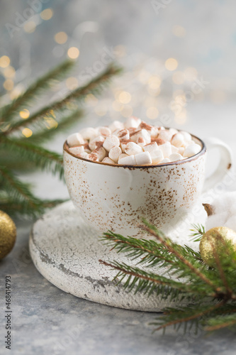 Mug of hot chocolate with candy marshmallows. Winter beverage.  Holiday concept, Selective focus