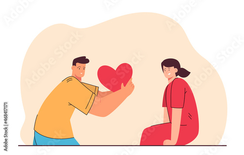 Boy giving romantic red heart to girl on date or on Valentines Day. Declaration or confession of love flat vector illustration. Love, relationship concept for banner, website design, landing web page