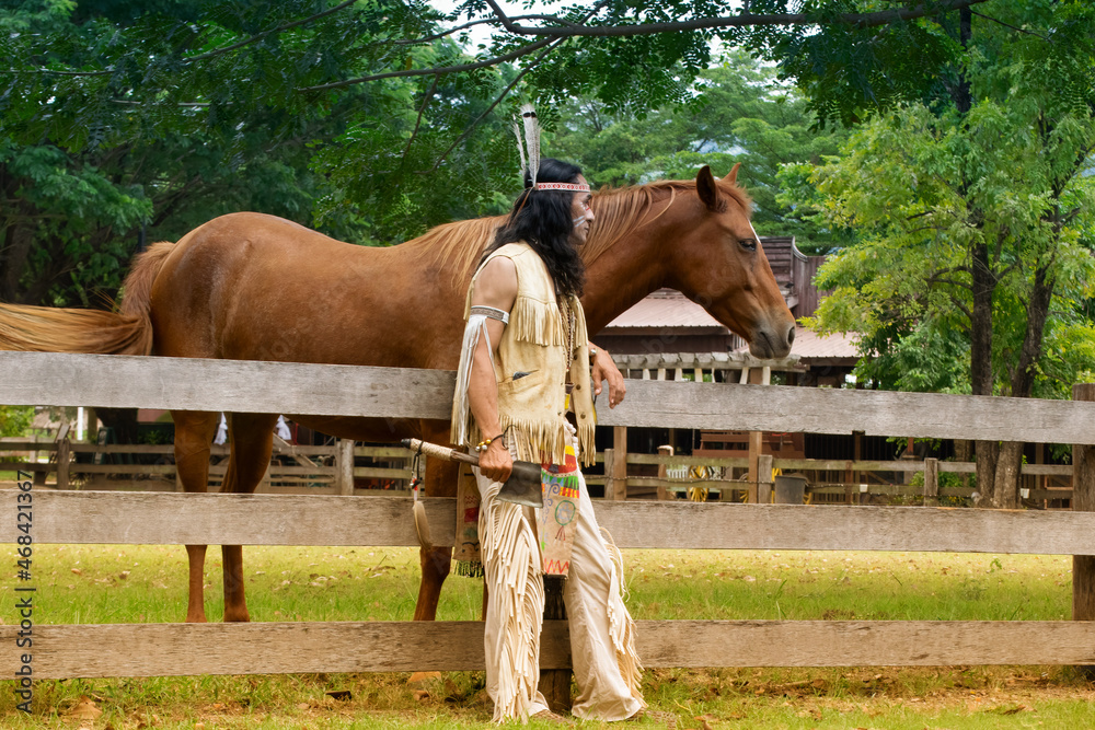 native Americans.Americans Indian man with horse .