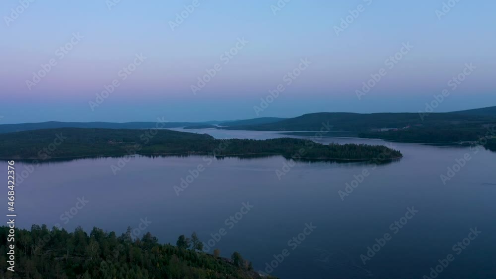 Coastal landscape at dusk. Aerial view of islands archipelago landscape in northern Sweden. High Coast bay. Coastal landscape at dusk. Aerial view of islands archipelago landscape in northern Sweden. High Coast bay.