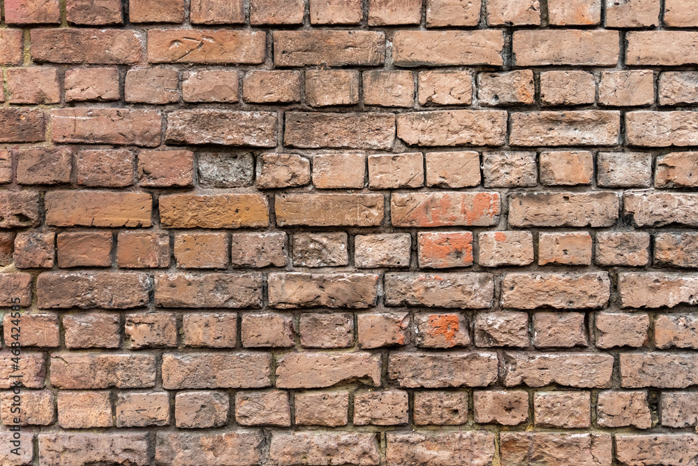 Old brick wall texture background. Closeup. Old brick wall texture background. Closeup.