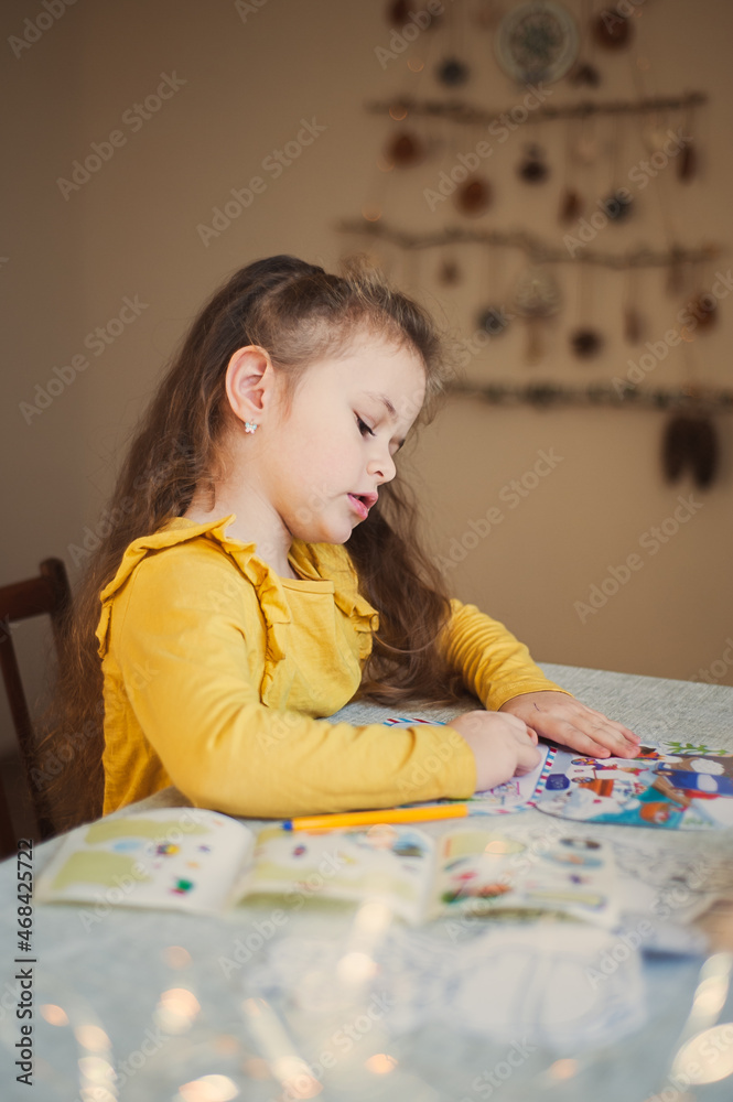 Cute little girl writes a letter to Santa Claus. Christmas concept Cute little girl writes a letter to Santa Claus. Christmas concept