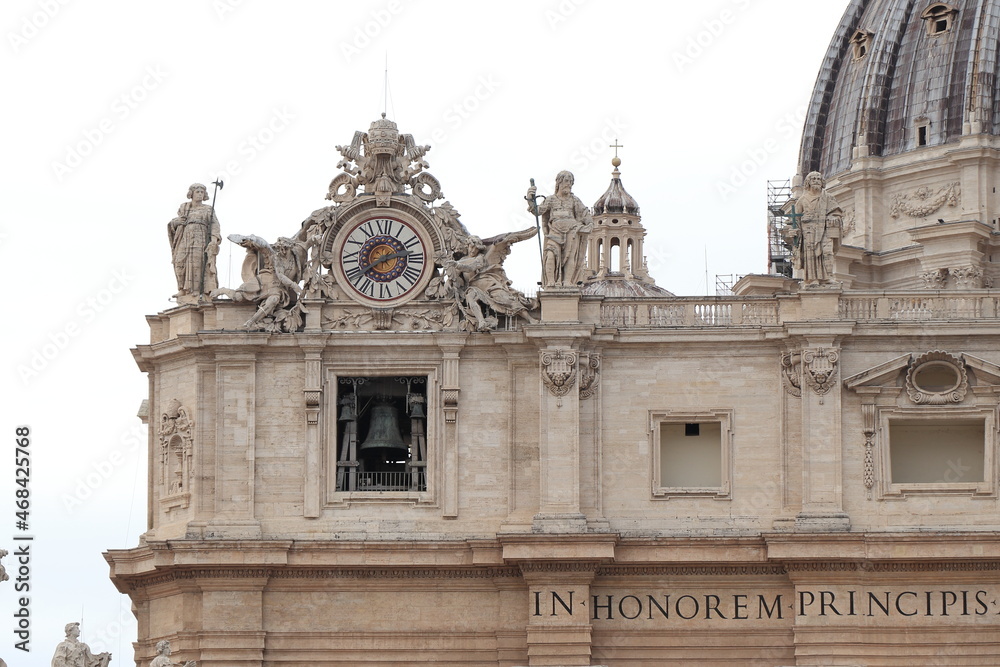 St. Peter's Basilica Facade Detail with Sculpted Clock in Rome, Italy