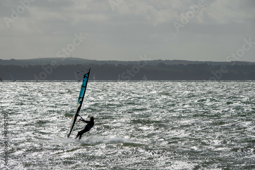 Windsurfer on The Solent with The Isle of Wight in the background