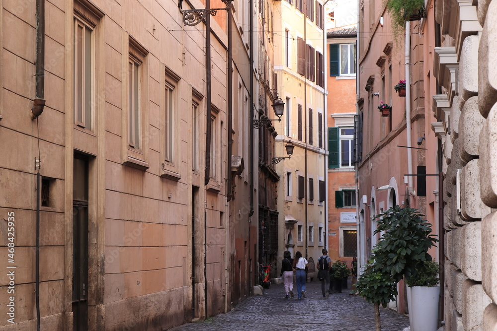 Rome Street View with House Facades and Walking People, Italy