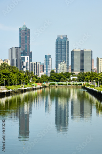Modern buildings in Kaohsiung, Taiwan, and the beautiful reflection of the Qianzhen canal.
