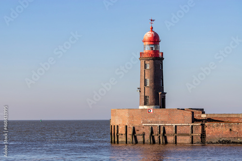 Geeste estuary breakwater light in Bremerhaven, Germany photo