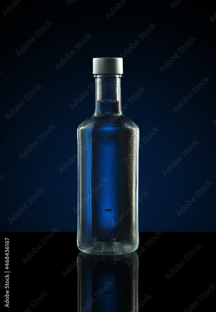 bottle of pure vodka on a background of a gradient bottle of pure vodka on a background of a gradient
