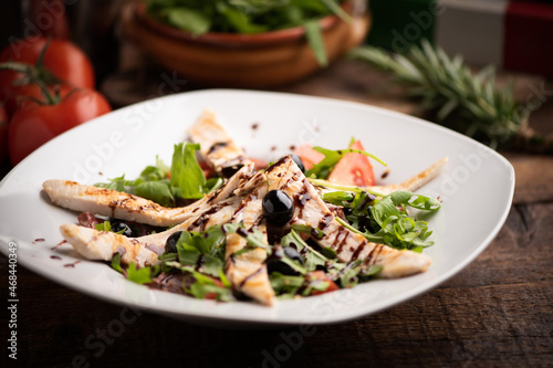 Fresh salad with chicken breast close up