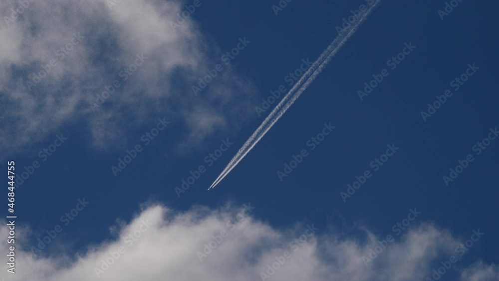 Commercial jet plane sneaks through the clouds. Air transport concept Commercial jet plane sneaks through the clouds. Air transport concept