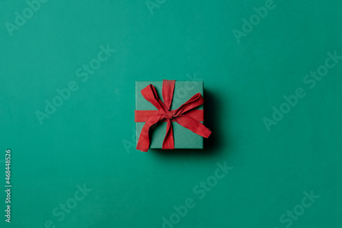 Holiday gift box on Paolo Veronese Green color background