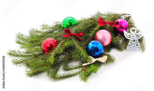 Branches of pine with Christmas toys.