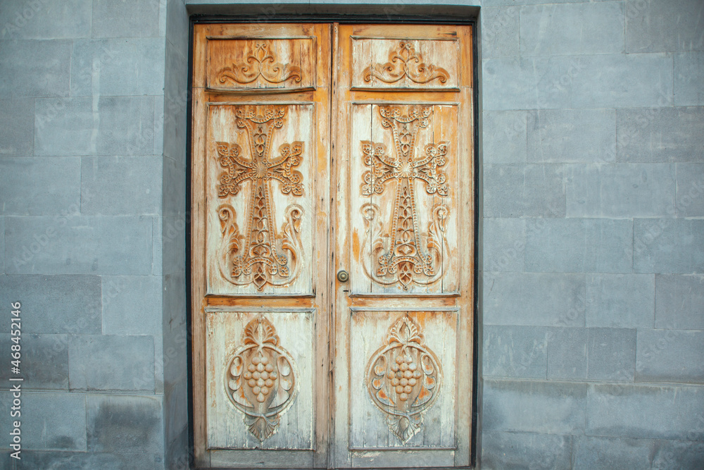 wooden doors of a Christian church