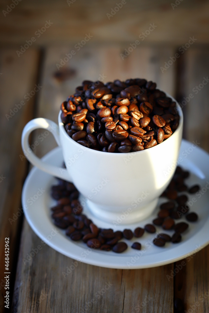 Selective focus. Coffee beans in a cup. Selective focus. Coffee beans in a cup.