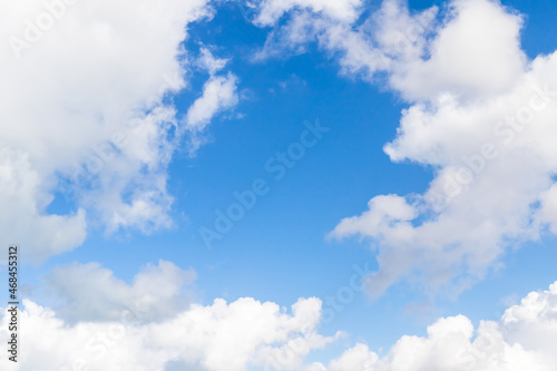 White cumulus clouds in blue sky on a daytime