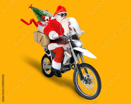 Santa Claus delivering Christmas or New Year presents and christmas tree