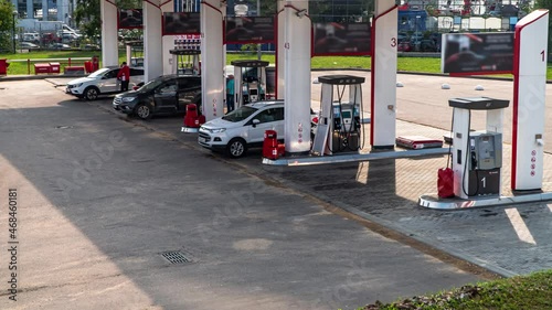 Cars on gasoline refueling station, time lapse